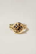 Leona Ring, an old European cut diamond in a bold bezel with cutouts, on a double-wire 18k yellow gold shank