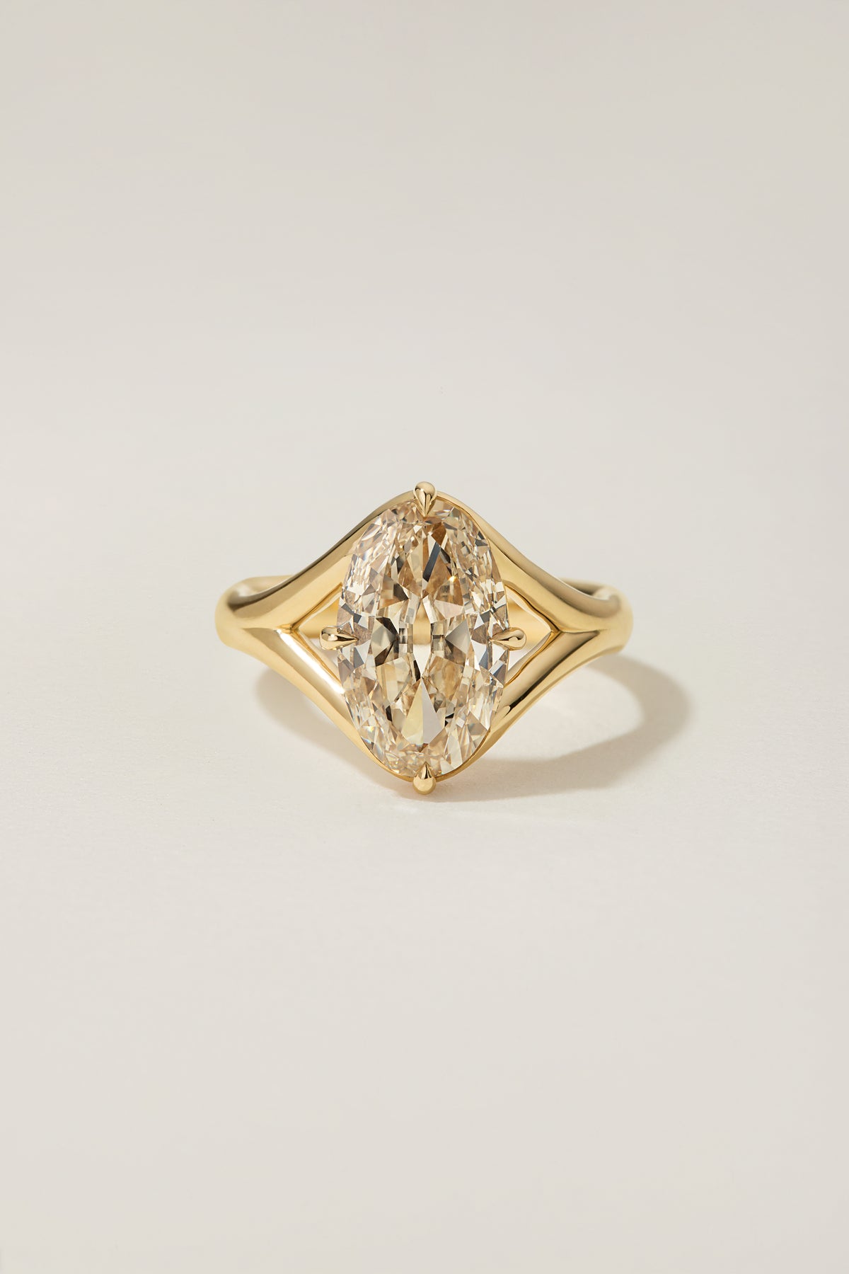 Mosie Ring, a 3.01 carat elongated oval diamond set north to south in compass prongs on a split shank
