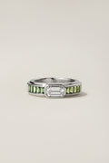 Zacca Ring, a 1.31 carat emerald cut diamond flanked by green sapphire baguettes